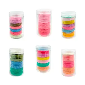 Bote transparente con 7 donas ligas de colores con efecto corrugado p…