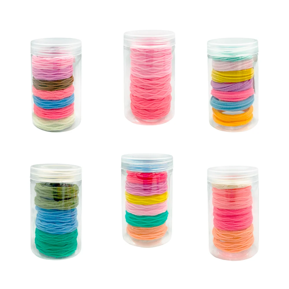 Bote transparente con 7 donas ligas de colores con efecto corrugado p…