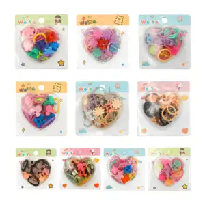 1pza blíster de diferentes formas con mini broches y ligas para el ca…