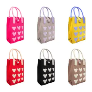 Bolsa cruzada de tela para celular con diseño tejido de corazones, in…