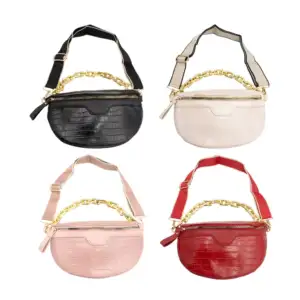 Bolsa chica con un compartimento de piel sintética con diseño de esca…