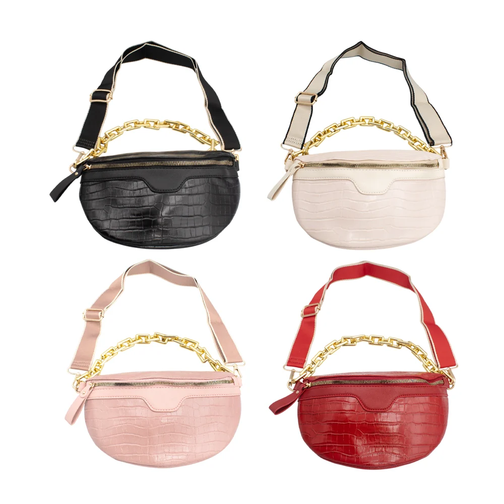 Bolsa chica con un compartimento de piel sintética con diseño de esca…