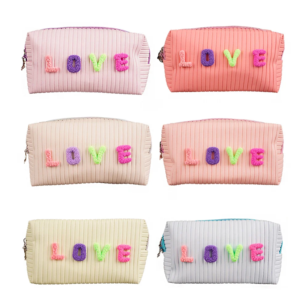 Cosmetiquera de cuero con letras de peluche love, variedad de colores…