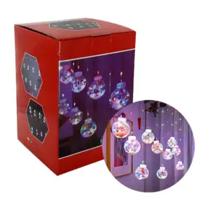 Serie de luz con 10 esferas transparentes con decoración navideña enc…