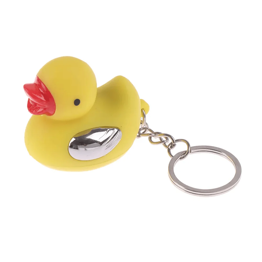 1pza Llavero de patito con argolla de metal, luz led y toques / cd-01…