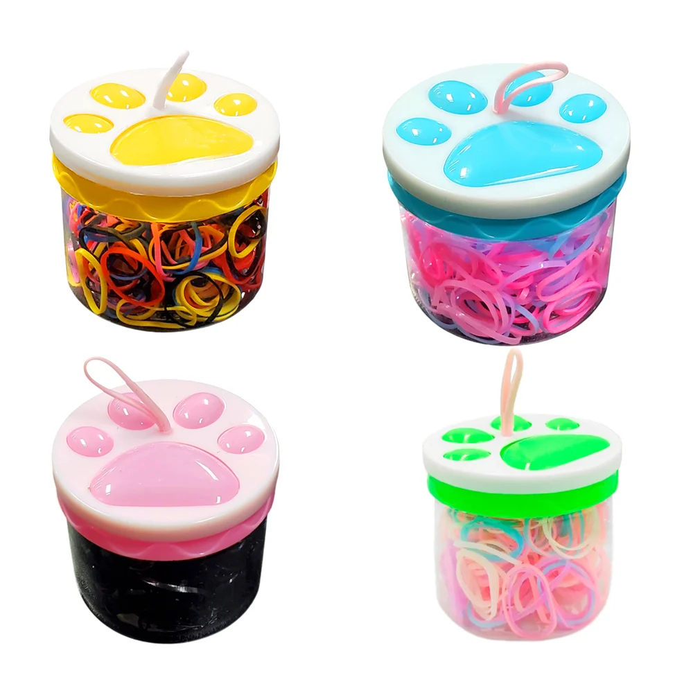 Bote transparente con tapa de huella, ligas gruesas de varios colores…