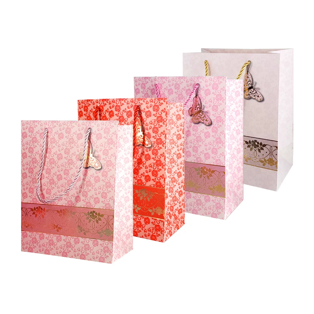Bolsa de regalo de 18 x 23 x 10 cm, con diseño de flores y detalle de…
