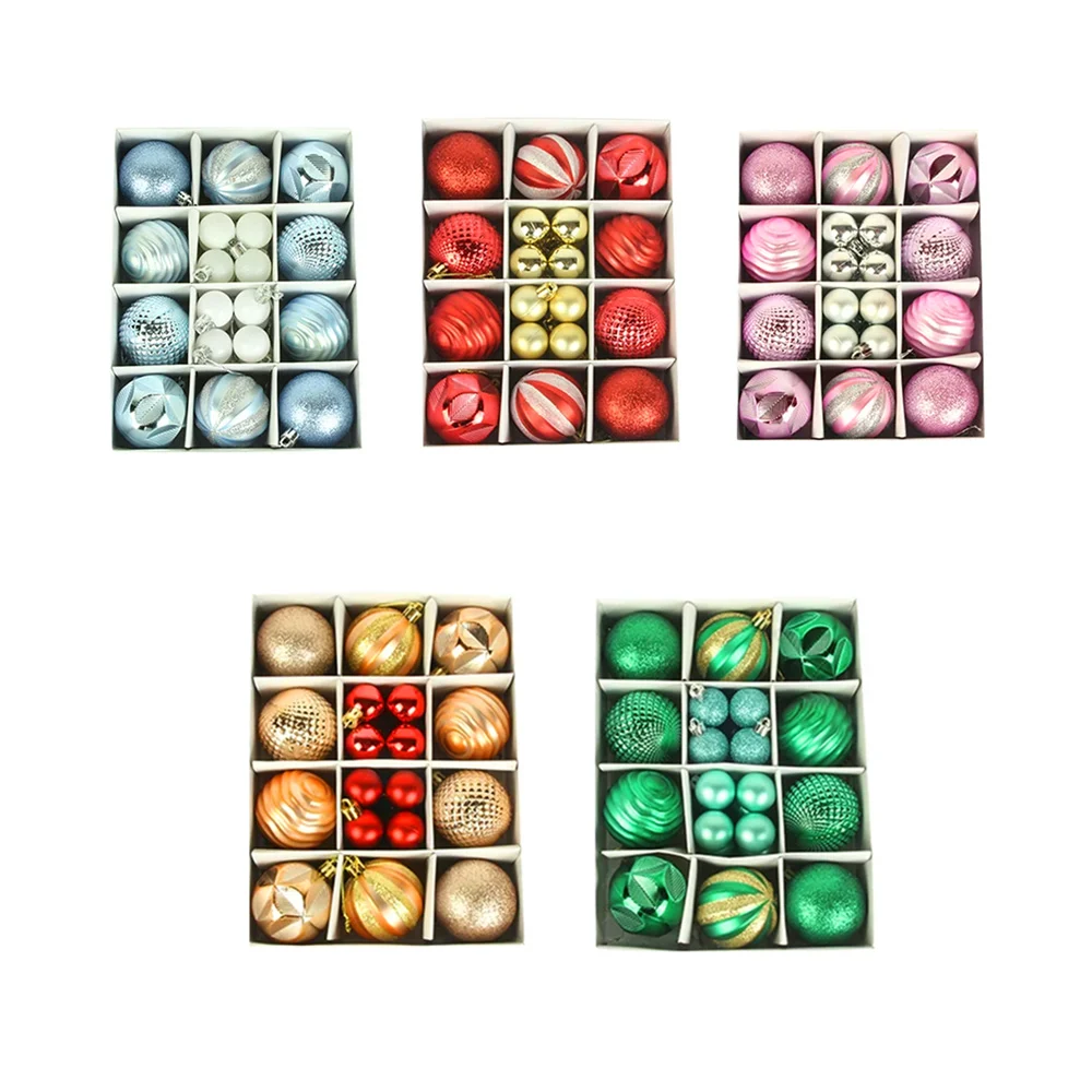 Caja con 26 esferas navideñas, 10 esferas grandes y 16 mini con diseñ…