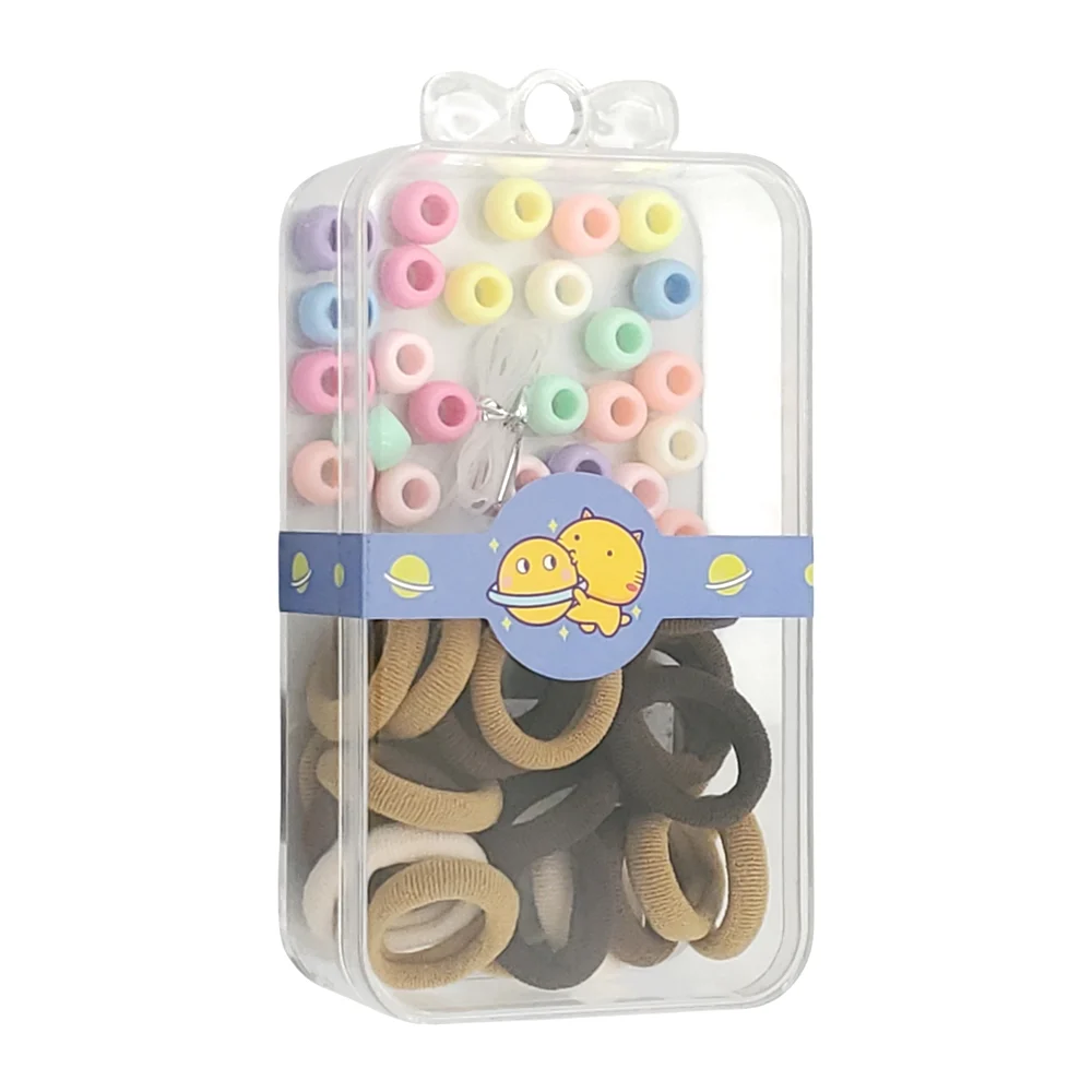 Estuche pequeño transparente con mini ligas para el cabello y bisuter…
