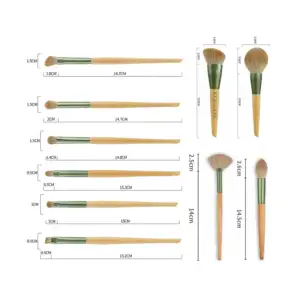 Bote cilíndrico de tipo piel con 10 brochas para maquillaje / cos.09