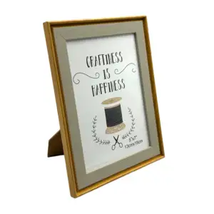 Portarretrato decorativo de 13x18cm con marco diseño tipo madera y bo…