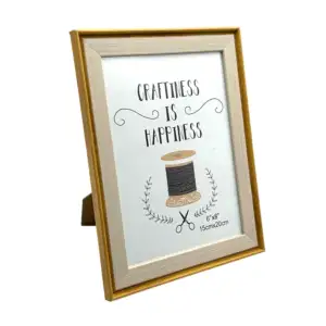 Portarretrato decorativo de 15x20cm con marco diseño tipo madera y bo…