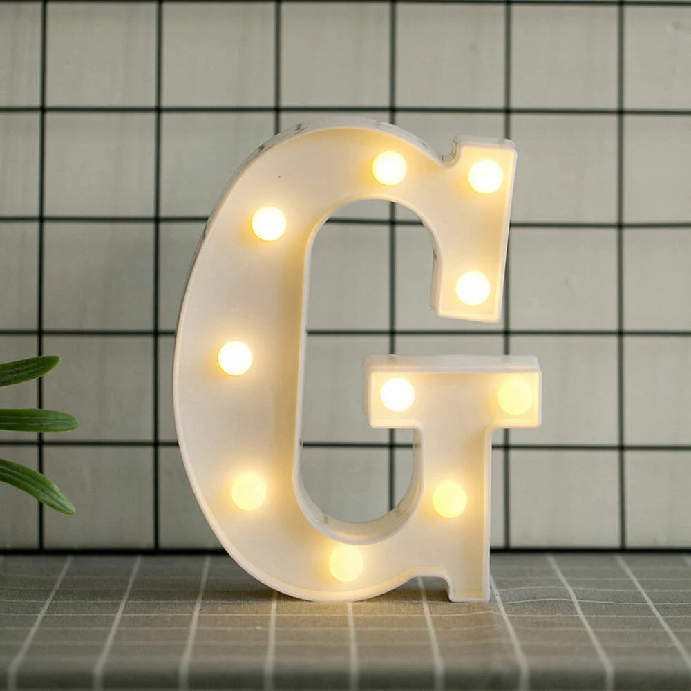 Lámpara de escritorio, con diseño de la letra G / led.54.g