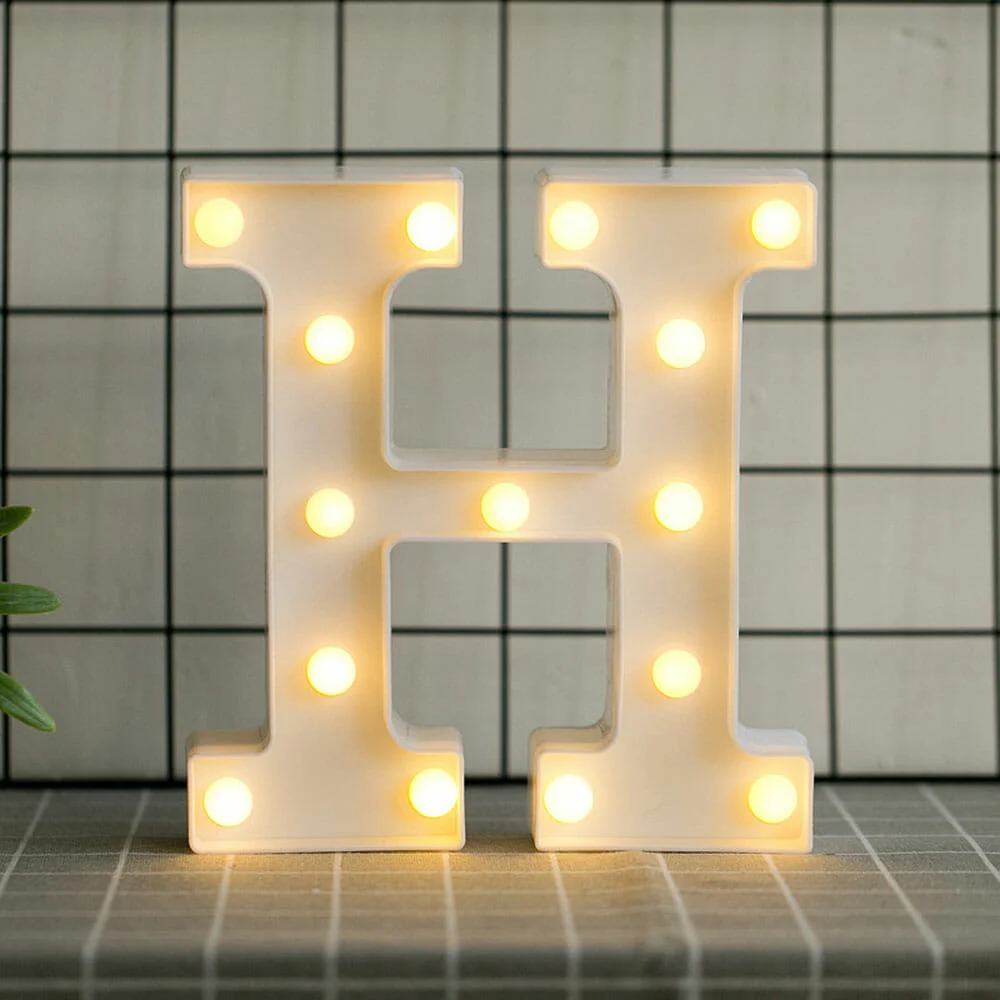 Lámpara de escritorio, con diseño de la letra H / led.54.h