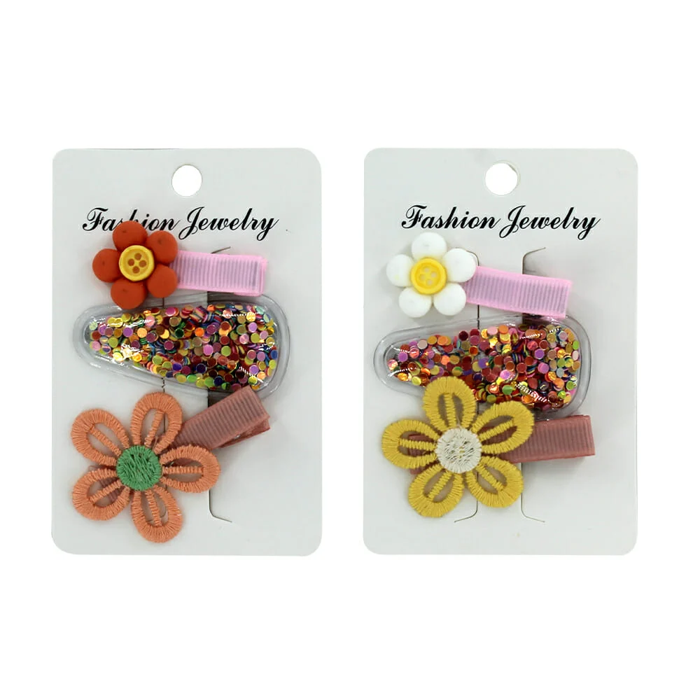Blíster 3 broches con decoración de flor y encapsulado de bolitas tor…