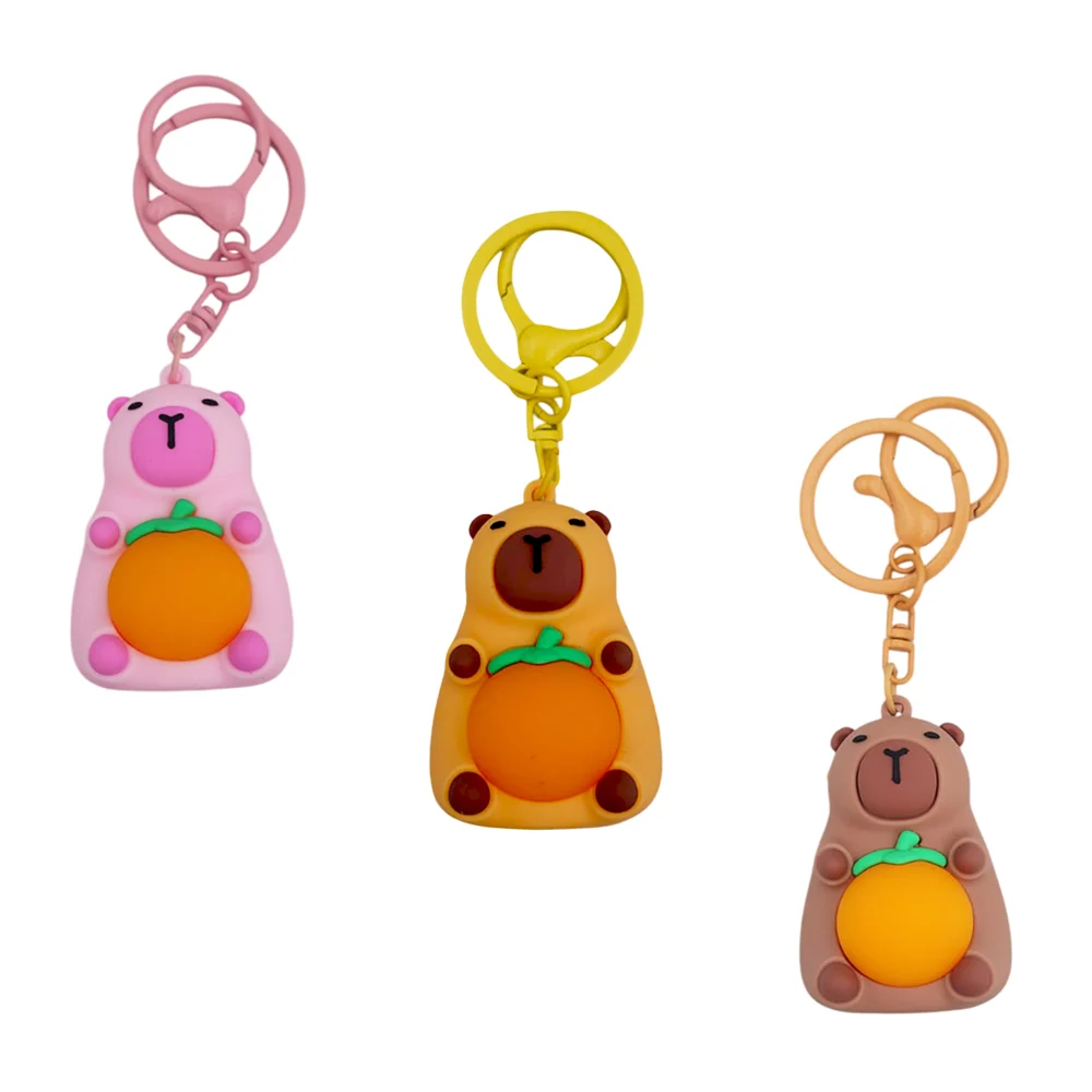 Llavero colgante en forma de capibara con naranja y luz led, variedad…