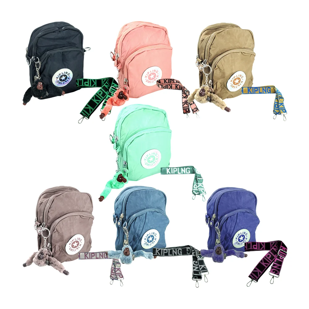 Bolsa kipling rectangular con 3 compartimentos, asa estampada y llave…