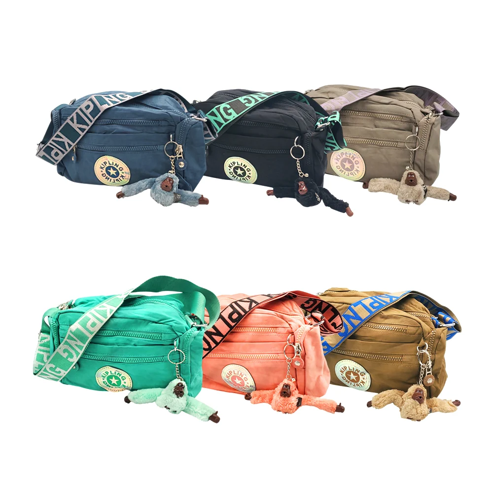 Bolsa kipling con 6 compartimentos, asa estampada + llavero de mono, …