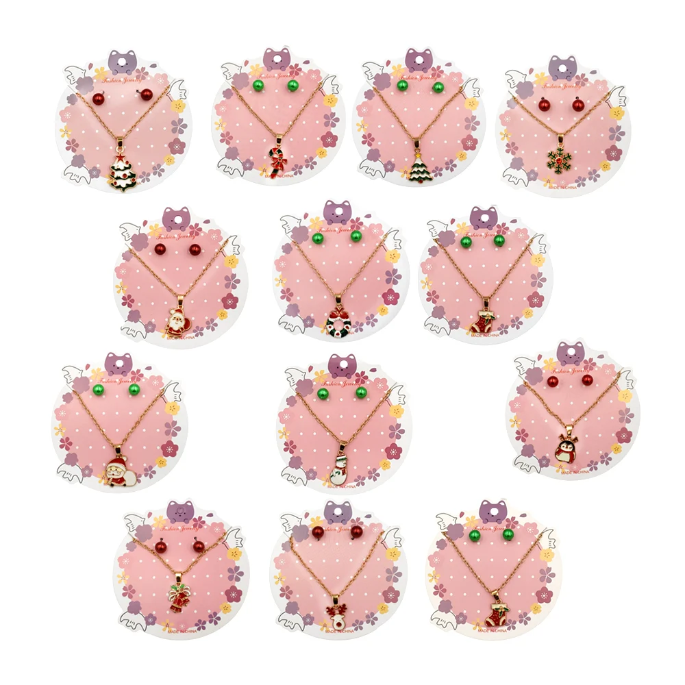 Juego de par de aretes y collar con dije navideño, varios modelos y c…