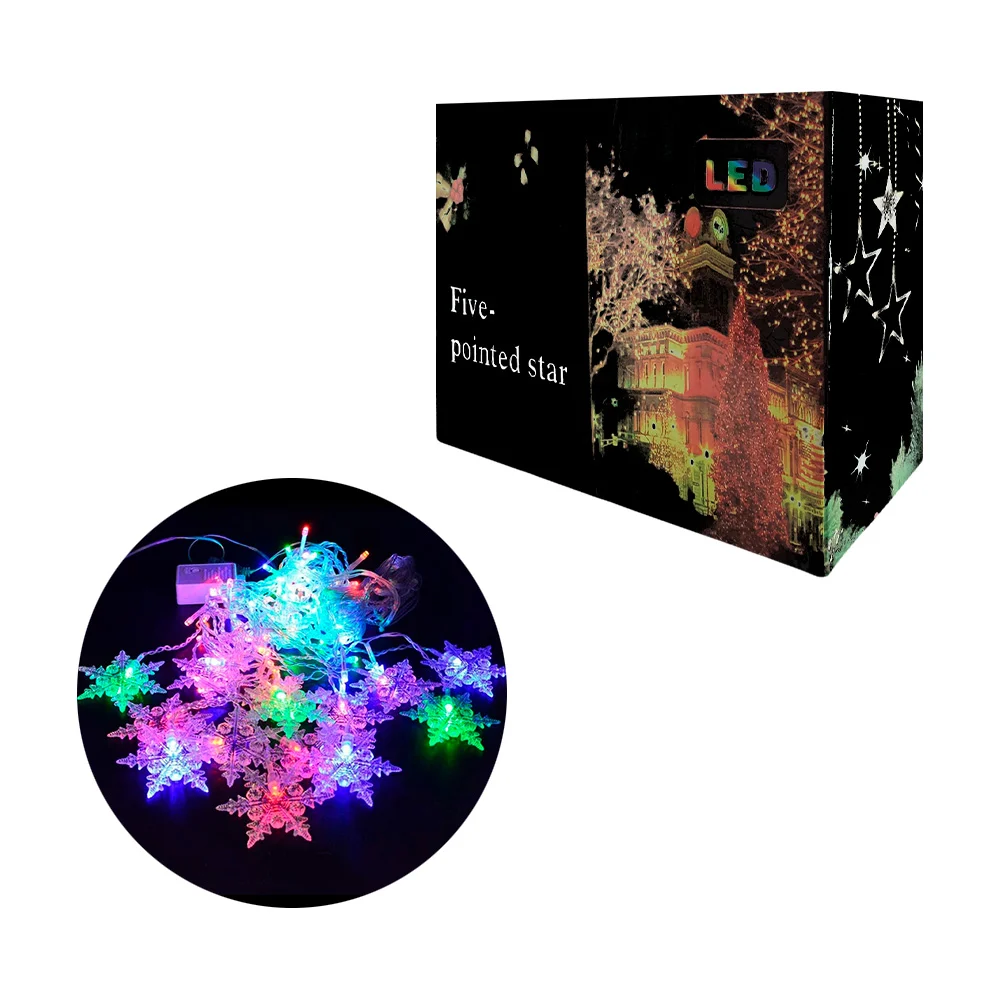 Serie de luz multicolor con decoración de estrellas y copos de nieve …