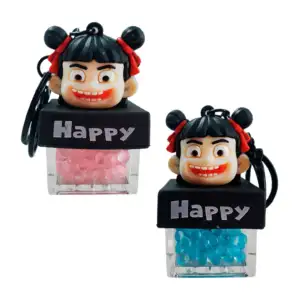 Llavero cabeza de muñeca en caja, encapsulado con pedrería + luz / ha…