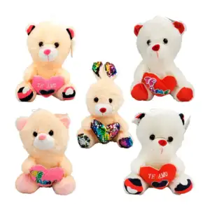 Peluche de animalito afelpado, corazón, detalle bordado o lentejuelas…