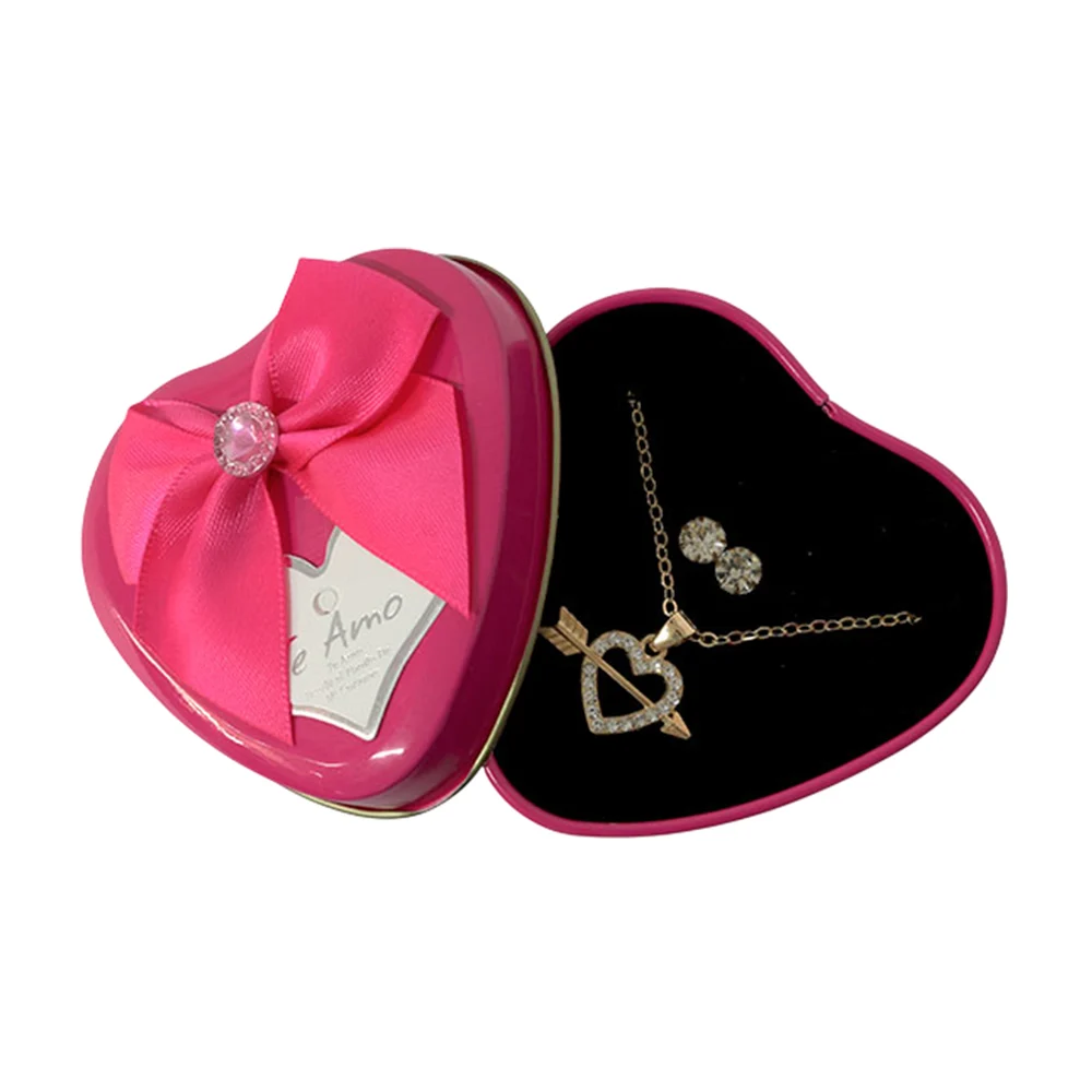 Estuche metálico chico en forma de corazón, collar y aretes, varios c…