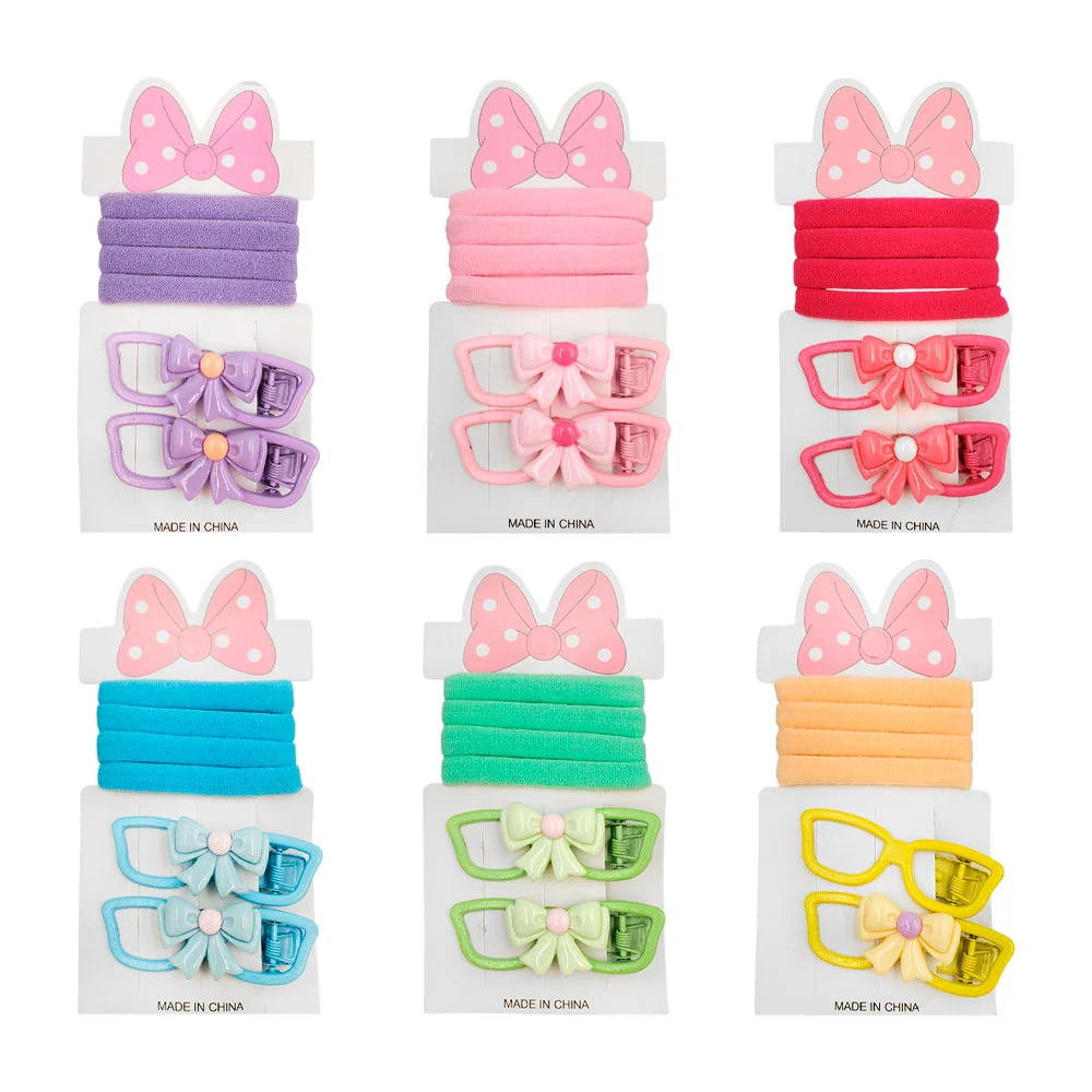Blíster 2 broches con diseño de moño + 4 donas para el cabello, color…