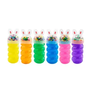 Bote espiral con slime brilloso y tapa de conejo con bolitas de color…