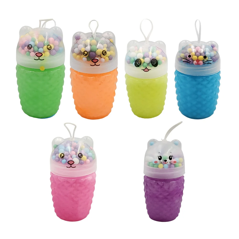 Bote de slime brilloso con rombos y tapa de animalito + bolitas de co…