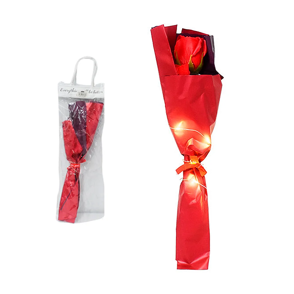 Bolsa de plástico con ramo pequeño de 3 rosas eternas + luces led