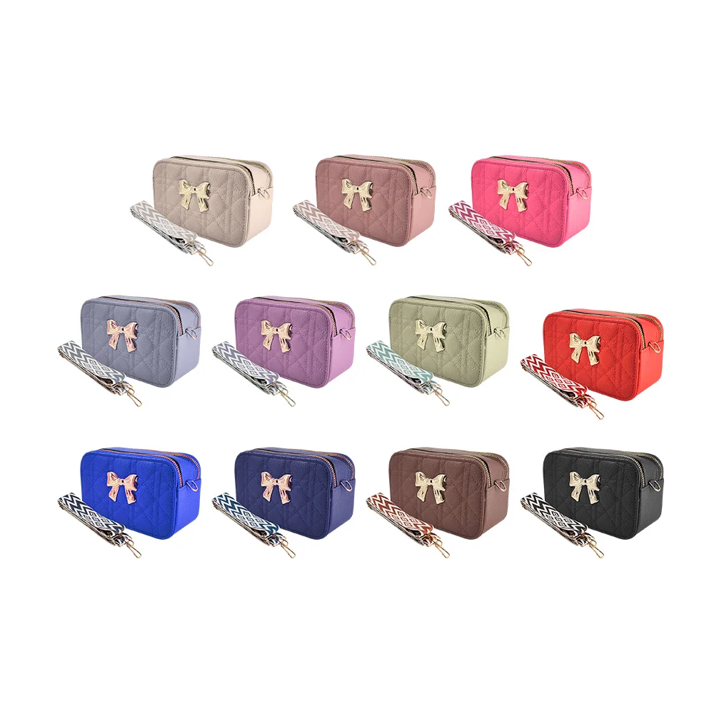 Bolsa de mano rectangular con 2 cierres dorados, detalle de moño y co…