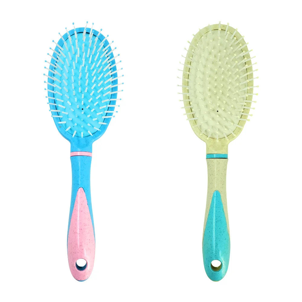 Cepillo ovalado con mango de plástico para el cabello, varios colores…