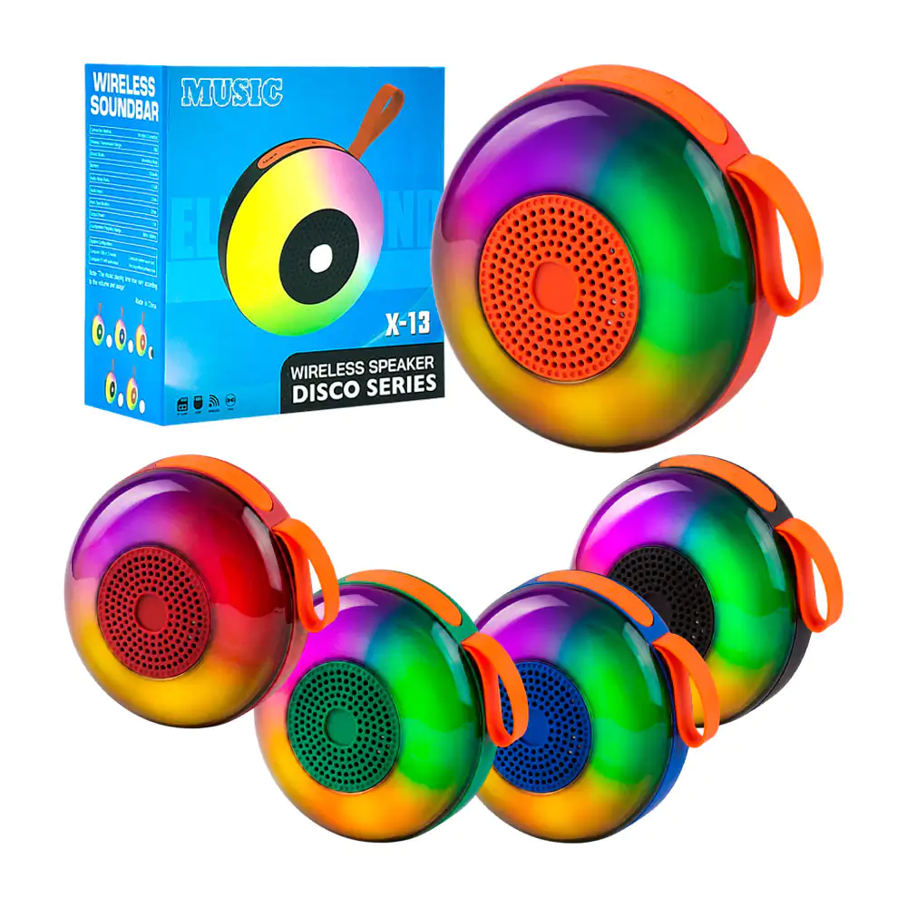Bocina redonda portátil bluetooth con asa + luz rgb, variedad de colo…