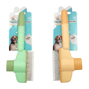 Cepillo vertical de plástico con cerdas metálicas y botón para remove…