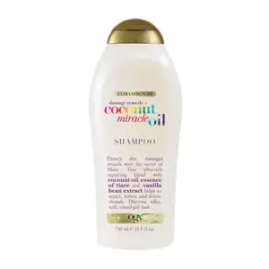 Shampoo ogx de 577ml con aceite de coco para reparar el cabello dañado