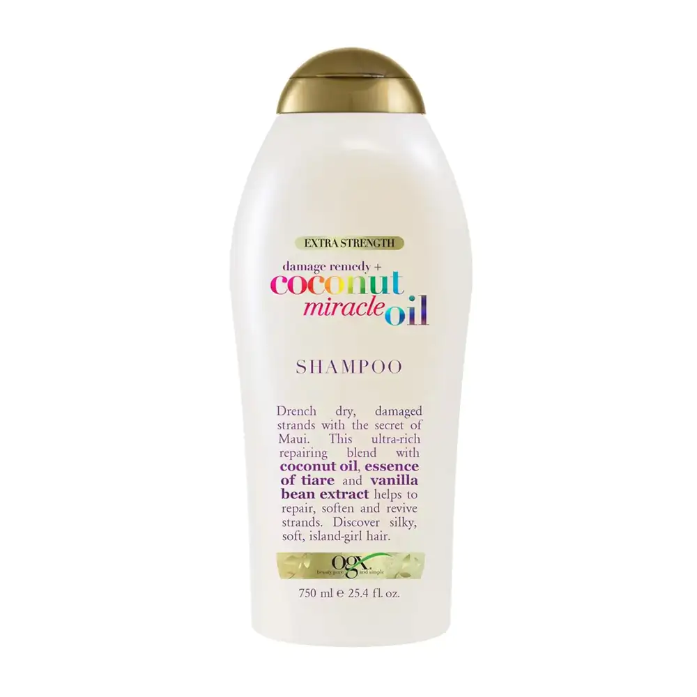 Shampoo ogx de 577ml con aceite de coco para reparar el cabello dañado