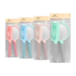 Set de espejo bicolor con orejas + peine de plástico con detalle de c…