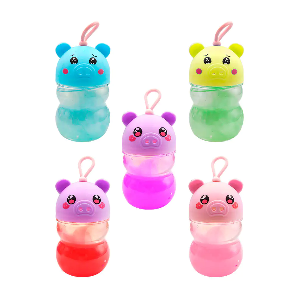 Bote pequeño de slime en forma de puerquito kawaii con figuritas torn…