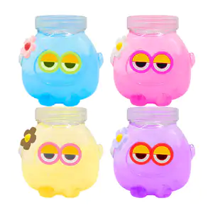 Bote pequeño con forma de duende con ojos y flor, slime con glitter, …