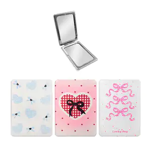 Espejo de bolsillo doble, rectangular con imán y estampado de moño co…