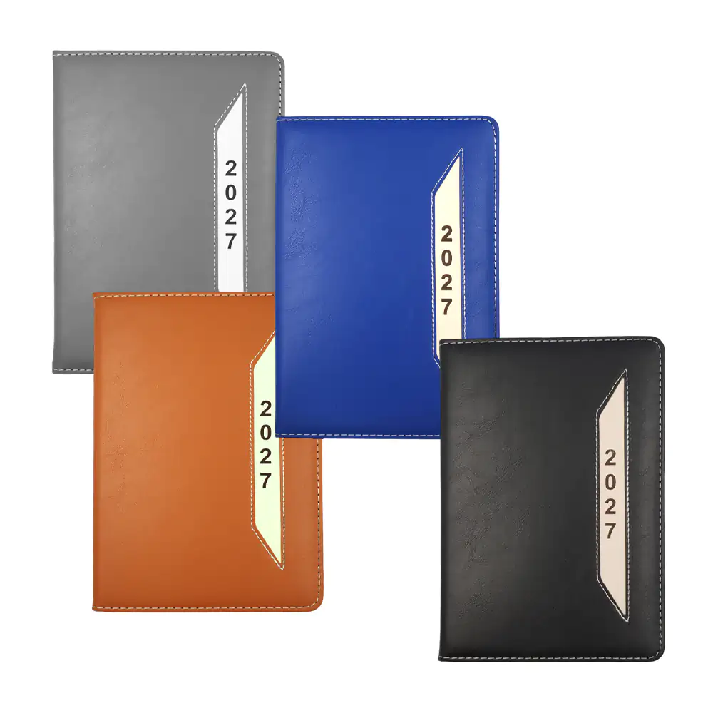 Libreta tipo agenda 2027 de 21x15cm con pasta acolchonada con separación mensual, variedad de tonos