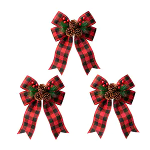 Paquete con 3 moños navideños con decoración de piña y frutos, tela t…