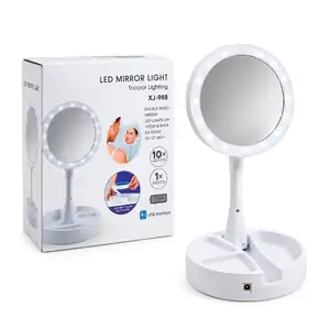 Espejo doble plegable con aumento 10x, base con 3 compartimentos + lu…