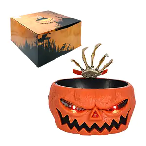 Dulcero con diseño de calabaza y mano de esqueleto sorpresa, luces y …