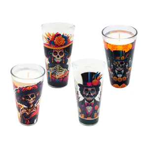 Veladora en vaso limonero de vidrio con imagen del día de muertos