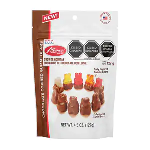 Paquete con ositos de goma albanese cubiertos de chocolate con leche,…