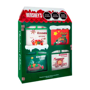 Caja en forma de casita navideña, con surtido de chocolates kisses y …