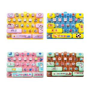 Mini teclado antiestrés con diseño infantil y switches azules, varied…