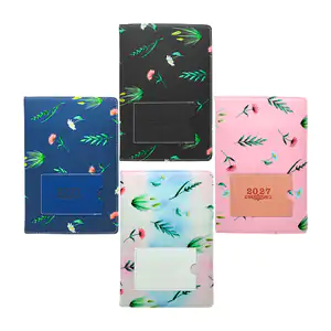 Libreta tipo agenda acolchada de 156 páginas con estampado de flores,…